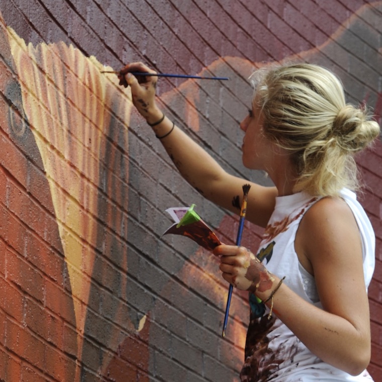 Students completing the Foundry Mural