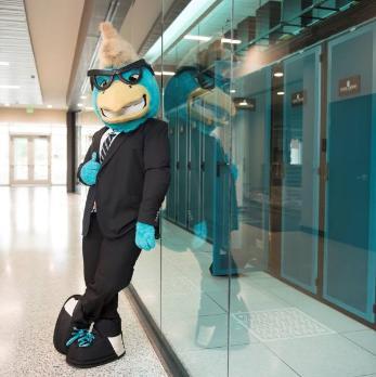 A picture of CCU's mascot, Chauncey, next to the Penny Hall Data Center.