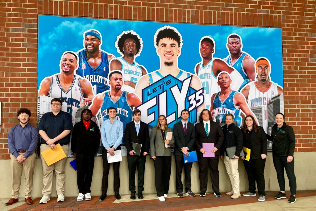 Photo of CCU sport management graduate students at Charlotte Hornets