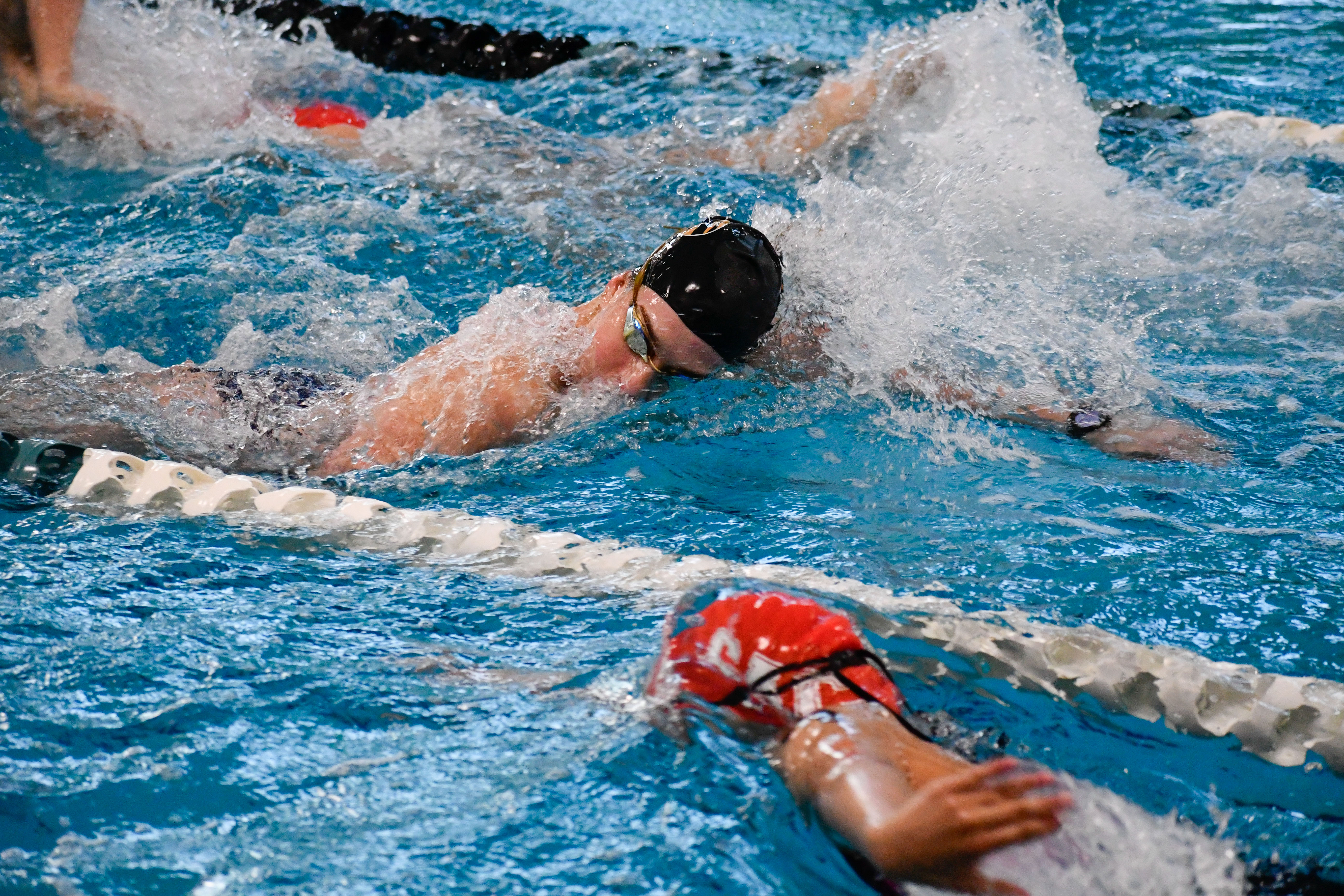 Photo of a swimmer swimming in pool at CCU triathlon