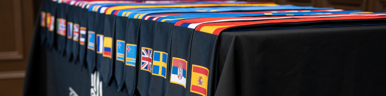 International Sashes displayed on a table.