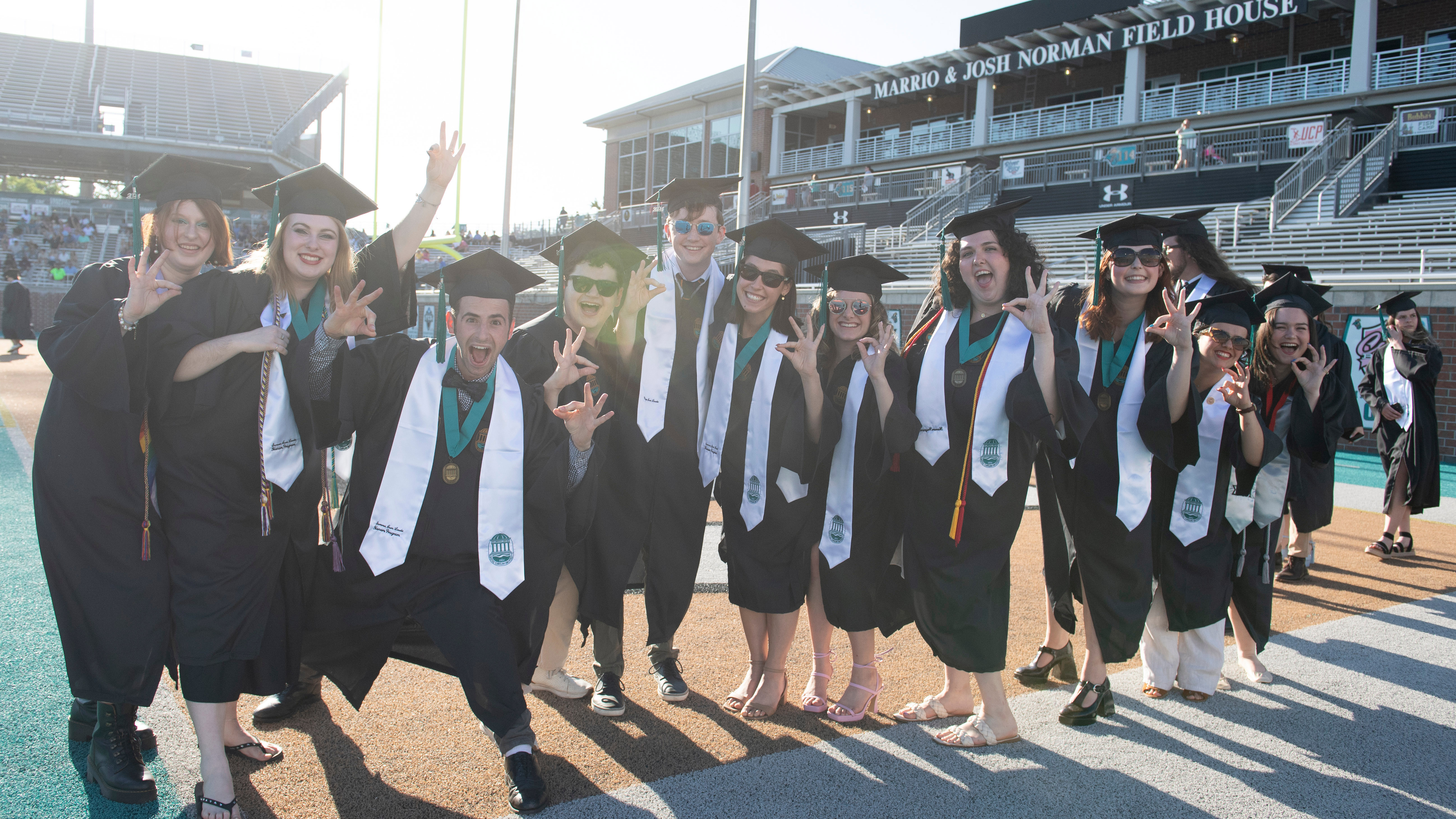 Students at Brooks Stadium for Spring Commencement