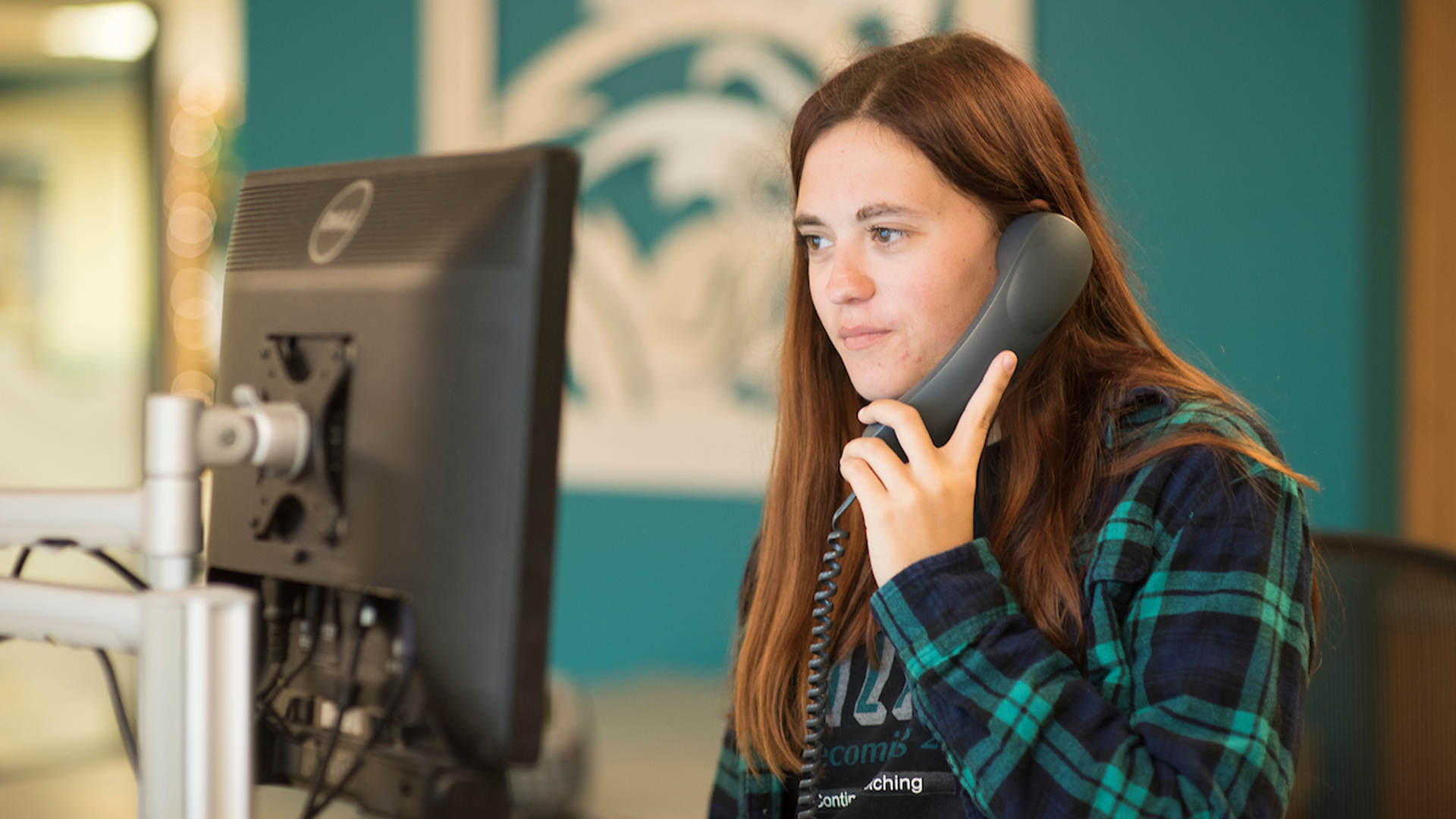 A CHANT411 representative answers the phone and provides information and answers about Coastal Carolina University